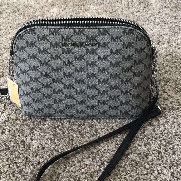Michael Kors Handbags - Michael Kors Monogrammed Dome Crossbody Bag
